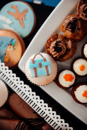 A top view of beautiful colorful cookies on a plate