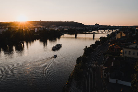 A beautiful Vltava river in Prague, the longest river in Czechia during a golden hourの写真素材
