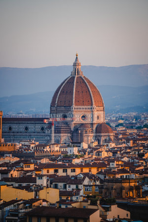 A vertical shot of the Cathedral of Santa Maria del Fiore and other buildings in Florence, Italyの写真素材
