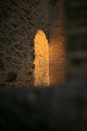 The sunlight on an old brick wall