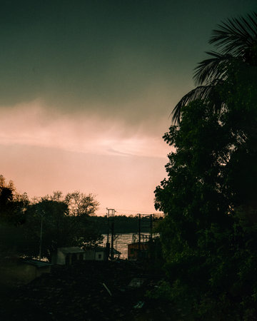 A rural area in the tropical forest on the sunsetの写真素材