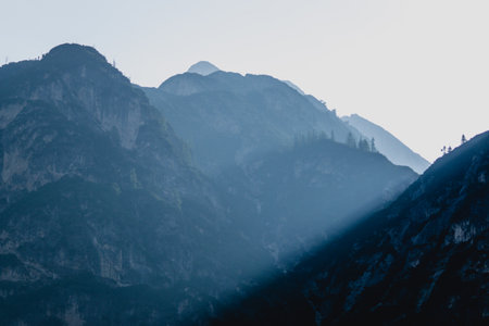 A beautiful silhouette of blue cliffs and mountains in Italyの写真素材
