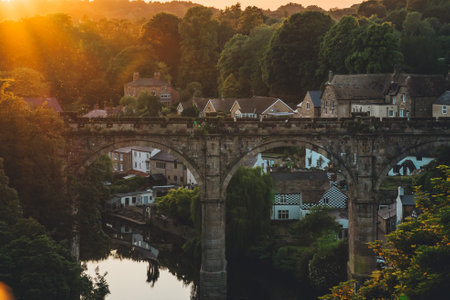 An amazing view of Knaresborough Viaduct with the reflection of the bridge in the lake in the UKの写真素材