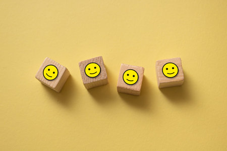 A closeup of the wooden blocks with emoji.