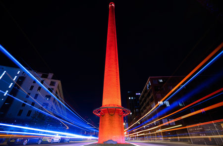 An illuminated tower with motion lights at nightの写真素材