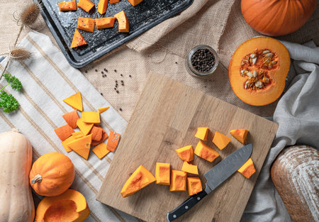 A top view of the makings of a delicious pumpkin soup and breadの写真素材