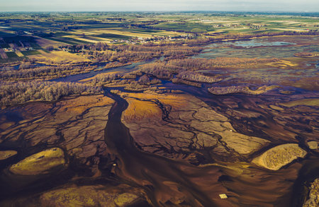 A scenic view of a rural landscape on a sunny weather