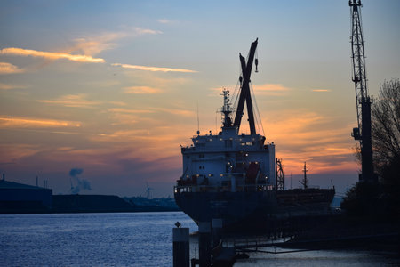 A beautiful view of a big ship in the sea at the sunsetの写真素材