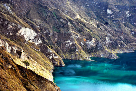 View of a water-filled crater lake and the most western volcano in the Ecuadorian Andesの写真素材