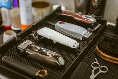 A set of shaving machines on a table in a barber shopの写真素材