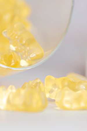 A vertical shot of delicious gummies in the glassの写真素材