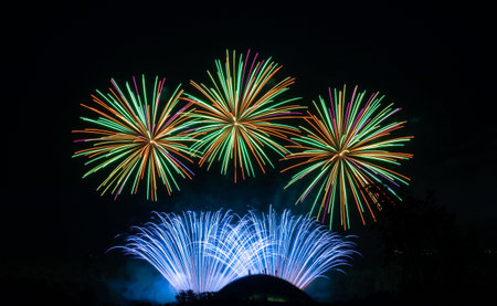 A colorful fireworks display in a dark skyの写真素材