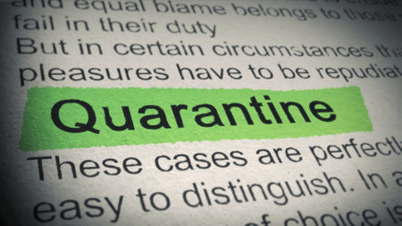 A closeup shot of a newspaper article with the work quarantine highlighted in greenの写真素材