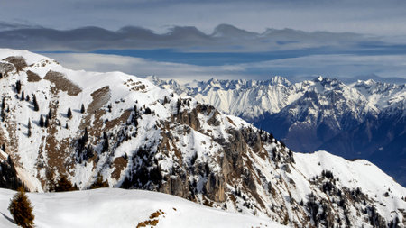 A beautiful shot of a landscape under the cloudy skiesの写真素材