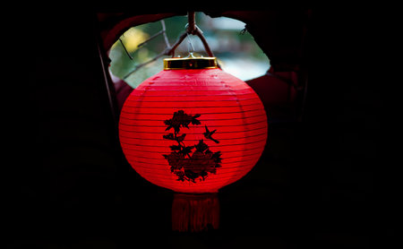 A closeup shot of a hanging red Chinese lanternの写真素材
