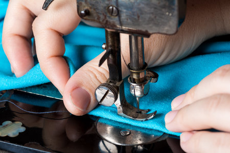 A woman sewing with a sewing machine