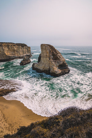 A vertical shot of Shark Fin Cove in Santa Cruz, Californiaの写真素材