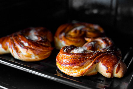 A closeup shot of freshly baked pretzels on a trayの写真素材