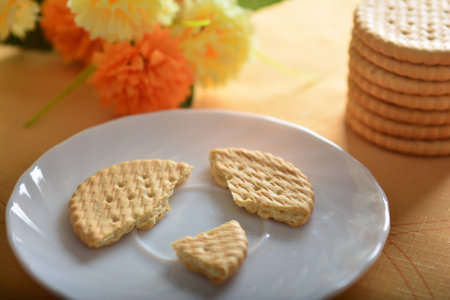 A closeup of Cookies crackers on a white plateの写真素材
