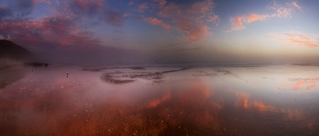 The panoramic view of the sea and the sky at sunset.