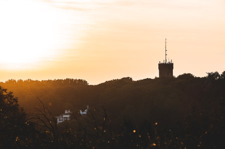The silhouette of a radio tower during the sunset in Hadleigh, Essex, Englandの写真素材