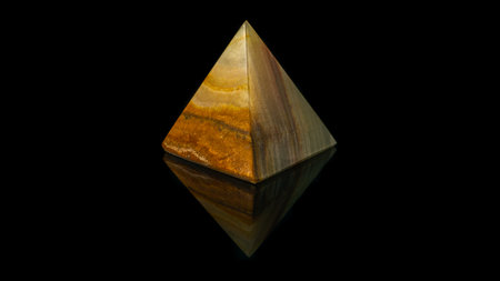 A closeup shot of pyramid of semiprecious stone tiger's eyesの写真素材