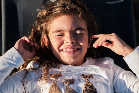 A closeup shot of a Caucasian happy girlの写真素材