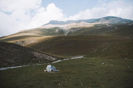 A beautiful view of green hills and mountains in Col de Larche, Franceの写真素材