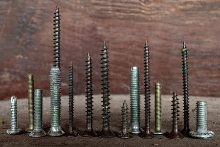 A selective focus shot of antique work tools - screws
