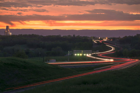 A long exposure of the highway captured at mesmerizing sunset