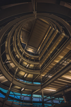 A vertical low angle shot of modern architecture ceiling in Berlin, Germany