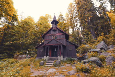 Old wooden chapel in the forest near Stozec, Czech republicの写真素材