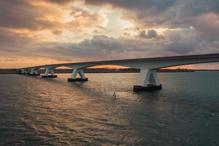 The view of the Zeeland Bridge in the evening. The Netherlands.の写真素材