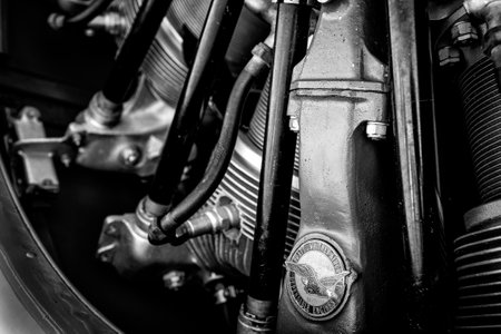 A closeup grayscale of an aircraft engine