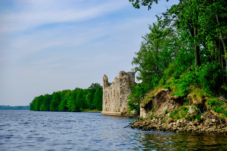 An old ruined wall of the Koknese castle near the seaの写真素材