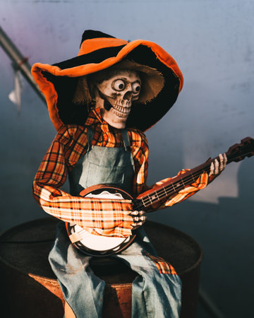 A vertical shot of the Halloween decoration with guitar playerの写真素材