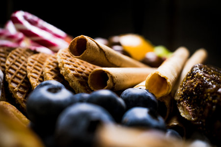 Tasty sweets and berries served as a dessertの写真素材