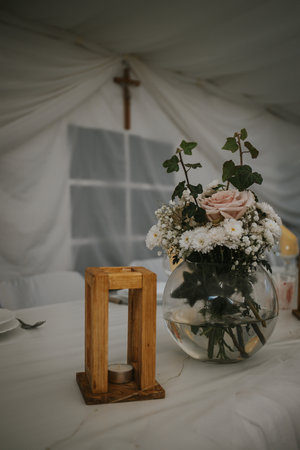 A closeup shot of a bridal bouquet of flowers with rosesの写真素材