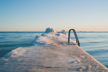 The view of a snowy frozen sea in Denmark
