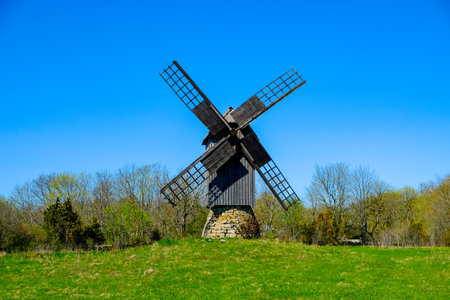 An old windmill in the middle of the field in Koguva Saaremaa, Estoniaの写真素材