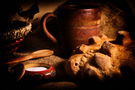 The vintage kitchen utensil and a breadの写真素材