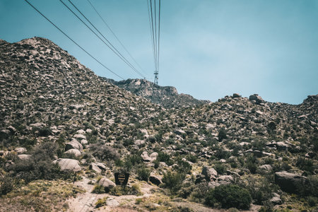 A beautiful view of Sandia Peak with the Tramway in Sandia, USAの写真素材