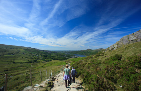 A path on the descent from Mount Snowdon towards Llanberis in Walesの写真素材