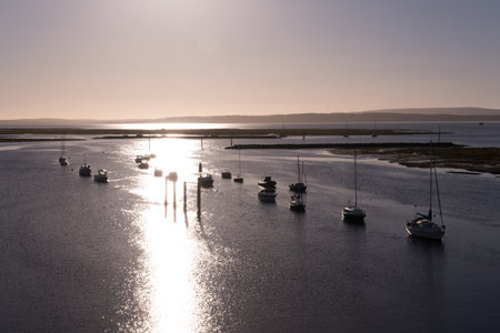 A view of ships in the sea at the sunset in the Isle of Wight and Coventry, Englandの写真素材
