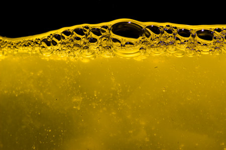 A yellow liquid with bubbles