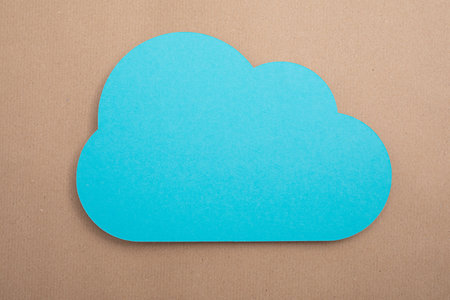 A blue paper cloud on a pastel background / Data conceptの写真素材