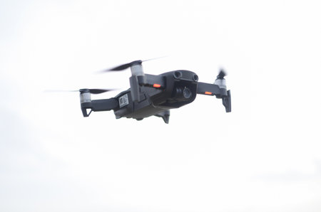 A closeup shot of a drone in motion during the day