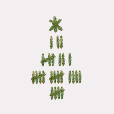 A Christmas tree made of branches as tally marks on a white backgroundの写真素材