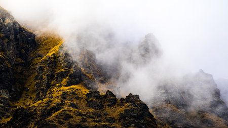 An eerie scenery of the majestic misty mountainsの写真素材