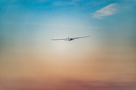 A beautiful shot of a toy airplane in the air